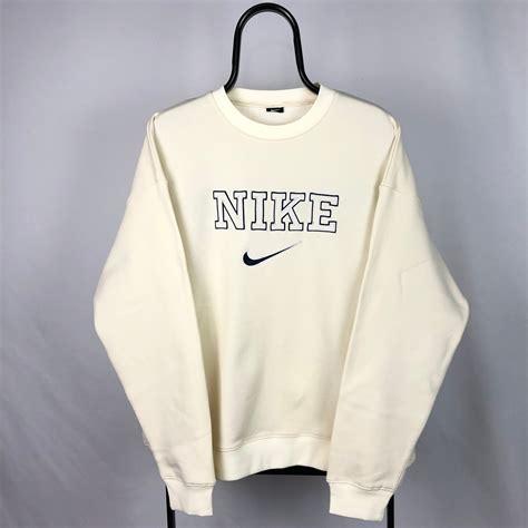 Get Cozy in Style with Nike's Spell Out Sweatshirt